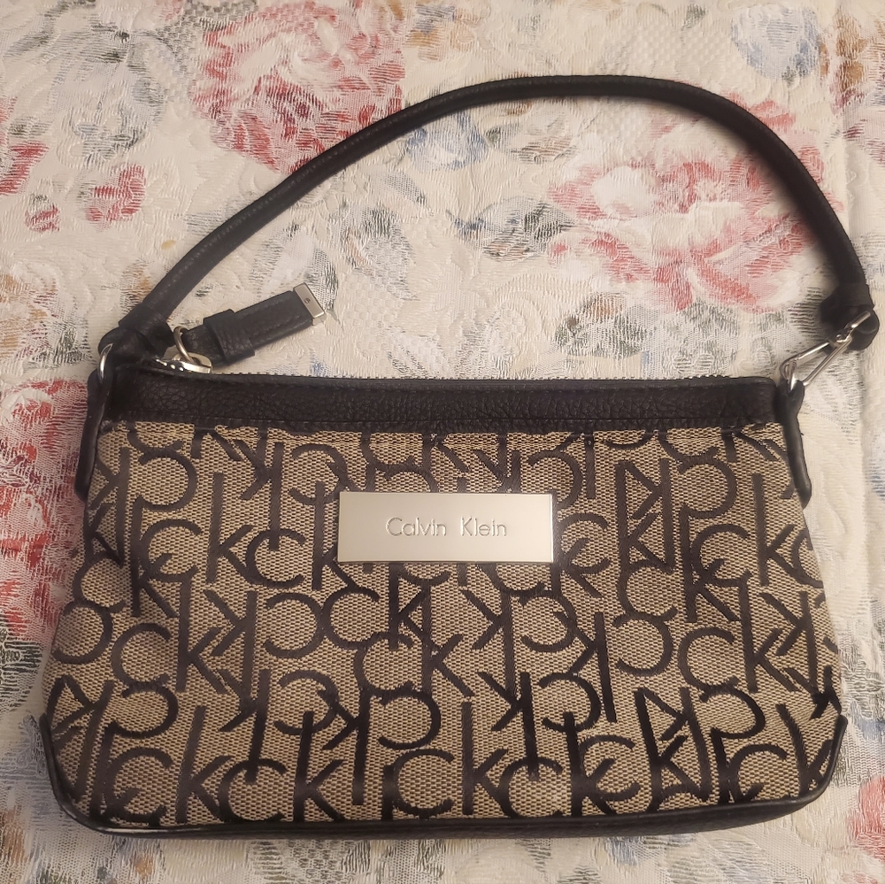 Gently used Calvin Klein mini bag black and gray monogram